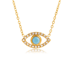 Golden Evil Eye pendant necklace with blue and clear zircon stones on a white background