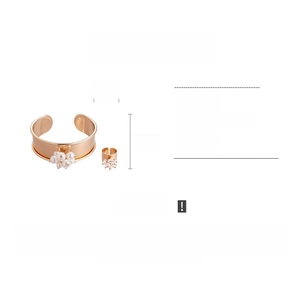 Detailed view of metal flower jewelry set with faux pearls and precise dimension labels