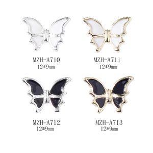 Breloques papillon 3D pour nail art en émail noir et blanc avec cadres or et argent