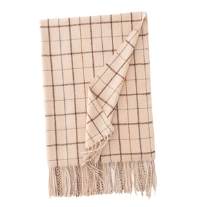 Classic beige checkered scarf with tassel edges made of soft warm fabric on white background