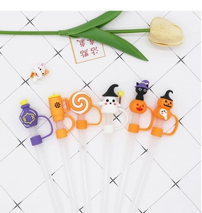 Close-up of 6 unique Halloween silicone straw covers featuring ghost and pumpkin designs