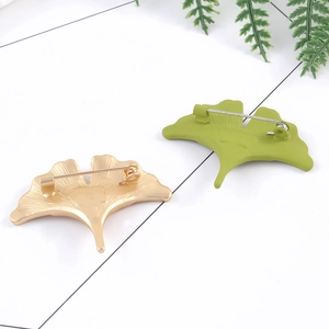 Elegant gold and green ginkgo leaf brooches set for women's fashion clothing accessory