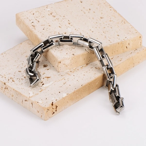Polished silver 12mm stainless steel bamboo-style chain bracelet for men in industrial design