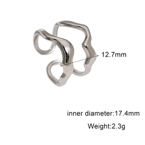 Detailed view of silver irregular wave ring showing dimensions 12.7mm width and 17.4mm inner diameter