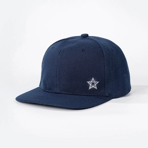 Detail of navy flat brim baseball cap featuring a white-bordered blue star logo embroidery