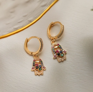 Gold Hamsa Hand hoop earrings with multicolored gemstones and tree of life design