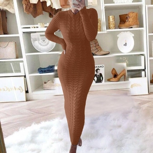 Detailed close-up of brown cable knit pattern on long sleeve slim fit knit dress