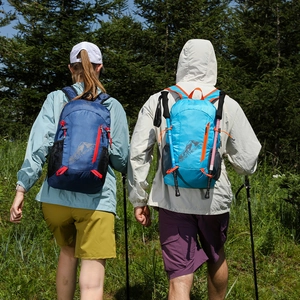 Waterproof nylon outdoor hiking backpacks in navy and sky blue for men and women