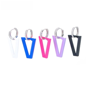 Detailed view of colorful geometric V-shaped hoop earrings with sparkling crystal accents