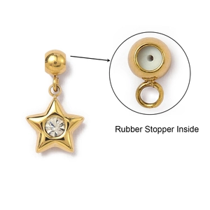 Macro view of gold star pendant with rubber stopper inside for DIY jewelry making