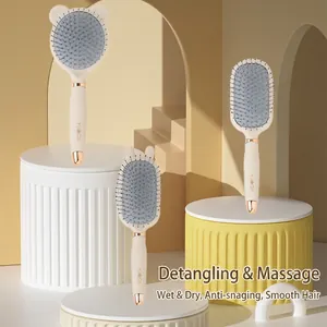 Three-piece massage hairbrush set with air cushion and cute ears in elegant cream color