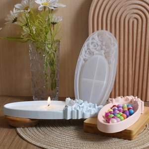 Macro view of silicone mold detail showing embossed rose floral texture on an oval tray