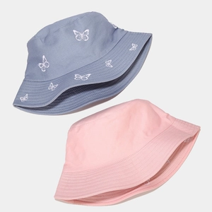 Close-up of butterfly embroidery on reversible cotton bucket hats for sun protection