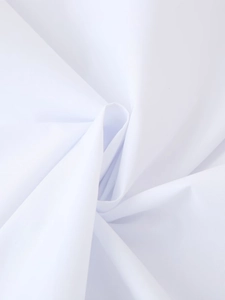 Close-up detail of white sporty shirt fabric texture showing high-quality woven material