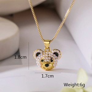 Detail view of pearl bear pendant with dimensions 1.8cm by 1.7cm and 6g weight