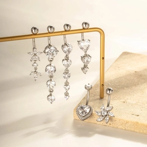 Collection of silver stainless steel belly rings with heart and flower zircon pendants