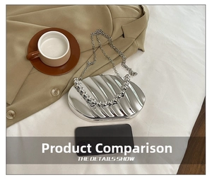 Silver shell-shaped acrylic evening bag showing size comparison with a smartphone