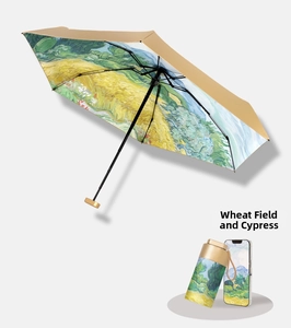 Compact Van Gogh Wheat Field umbrella with matching pouch next to a smartphone