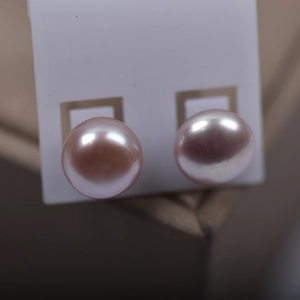 Pink and purple freshwater pearl stud earrings with minimalist square metal base