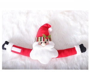 Detail of Santa Claus curtain tieback with plush texture and striped fabric accents