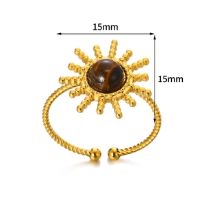 Bague vintage dorée ajustable avec pierre naturelle d'ambre ronde et design soleil