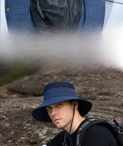 Detail of navy blue outdoor sun hat featuring breathable mesh top and adjustable chin strap