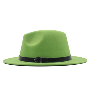 Close-up of bright green wool fedora hat featuring a black leather belt with silver buckle