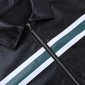 Detail of the stand collar and zip front with white and green stripes on a black jacket