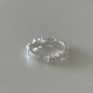 Minimalist 925 sterling silver open ring featuring a unique irregular textured surface
