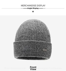 Detailed knit texture of dark grey wool blend beanie with small metallic NY&ED tag