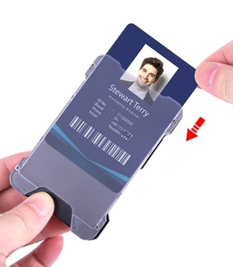 Detail showing the top-loading card insertion into the minimalist RFID metal wallet with window