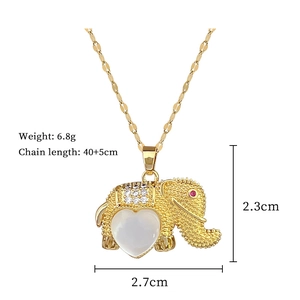 Detail showing gold elephant pendant dimensions 2.3cm by 2.7cm and technical specifications