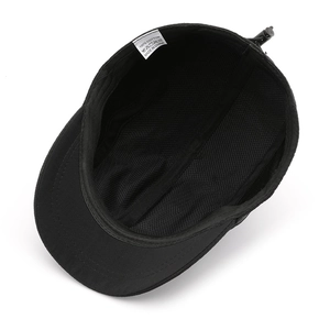 Interior detail of black cotton baseball cap with breathable mesh lining and adjustable cord