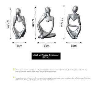 Three-piece silver thinker sculpture set with matte finish and minimalist abstract design