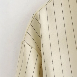 Women's cropped striped shirt in beige twill fabric featuring vertical black lines
