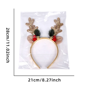 Detail view of gold reindeer antler headband with size dimensions of 28cm by 21cm