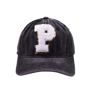 Washed charcoal denim baseball cap featuring large embroidered letter P with gold sequins