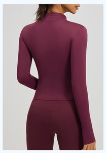 Detailed back view of dark burgundy slim fit yoga jacket with breathable stand collar