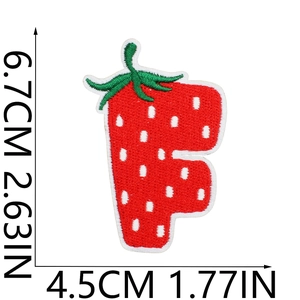 Macro view of strawberry letter F embroidered patch with size dimensions 6.7cm x 4.5cm
