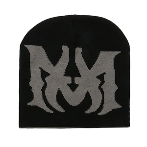 Close-up of black knitted beanie featuring gray Gothic style jacquard letter pattern