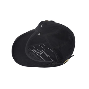 Close-up of black mesh cap interior with white Fashion embroidery and gold metal buckle