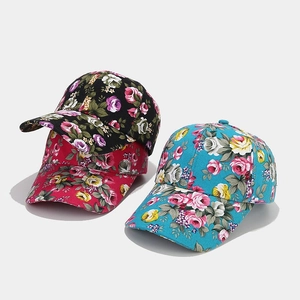 Floral canvas baseball hats in black, rose red and blue with realistic flower patterns