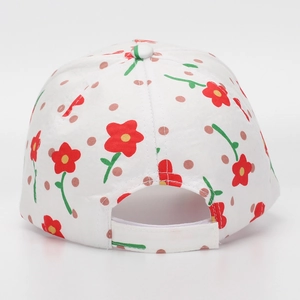 Detail of adjustable back strap on white canvas baseball cap with red floral print