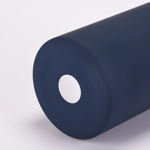 Close-up of the anti-slip silicone base on the matte dark blue sports water bottle