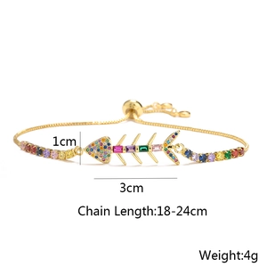 Detail showing dimensions of gold-plated fishbone bracelet with colorful zircon stones