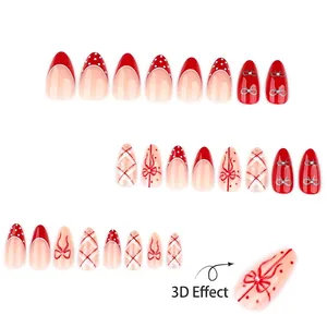 Red almond press-on nails set with 3D bows, French polka dots, and checkered patterns