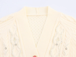 Detailed V-neck cable knit cardigan with elegant pearl and rhinestone embellishments