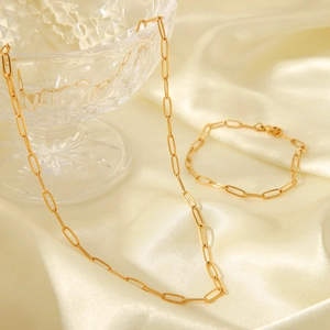 18K gold plated stainless steel chain necklace and bracelet set on gold silk
