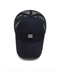Detail view of the breathable navy mesh structure and white stripes on the baseball cap