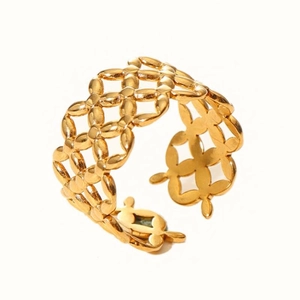 Macro shot of 18k gold plated mesh pattern ring with adjustable open band detail